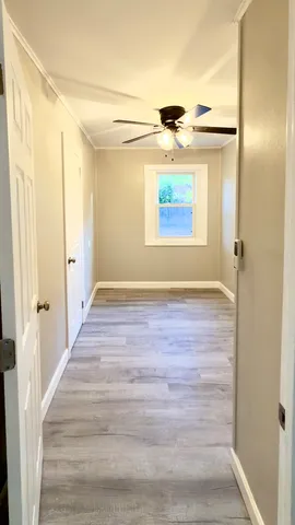 a view of hallway with stairs
