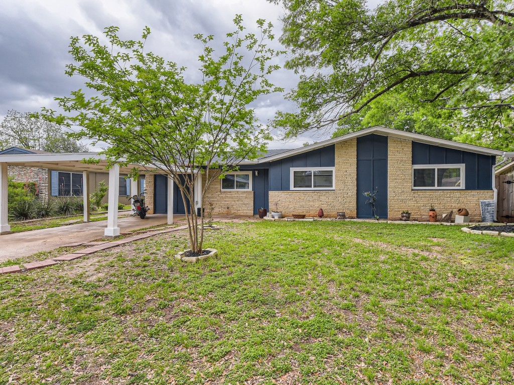 4603 Dudmar Drive Austin, TX 78735 - Photo 1 of 1 a house with trees in the background