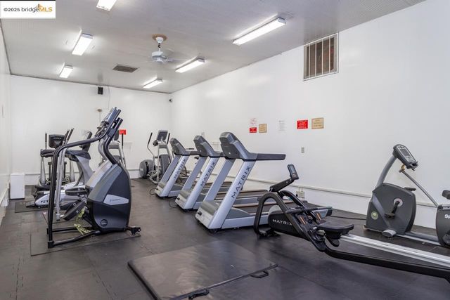 a view of a room with furniture and staircase