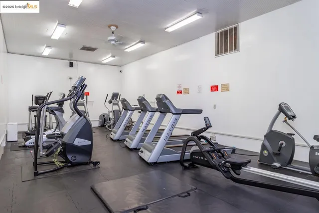 a view of a room with furniture and staircase