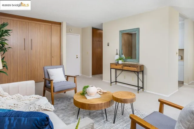 a living room with furniture and a lamp