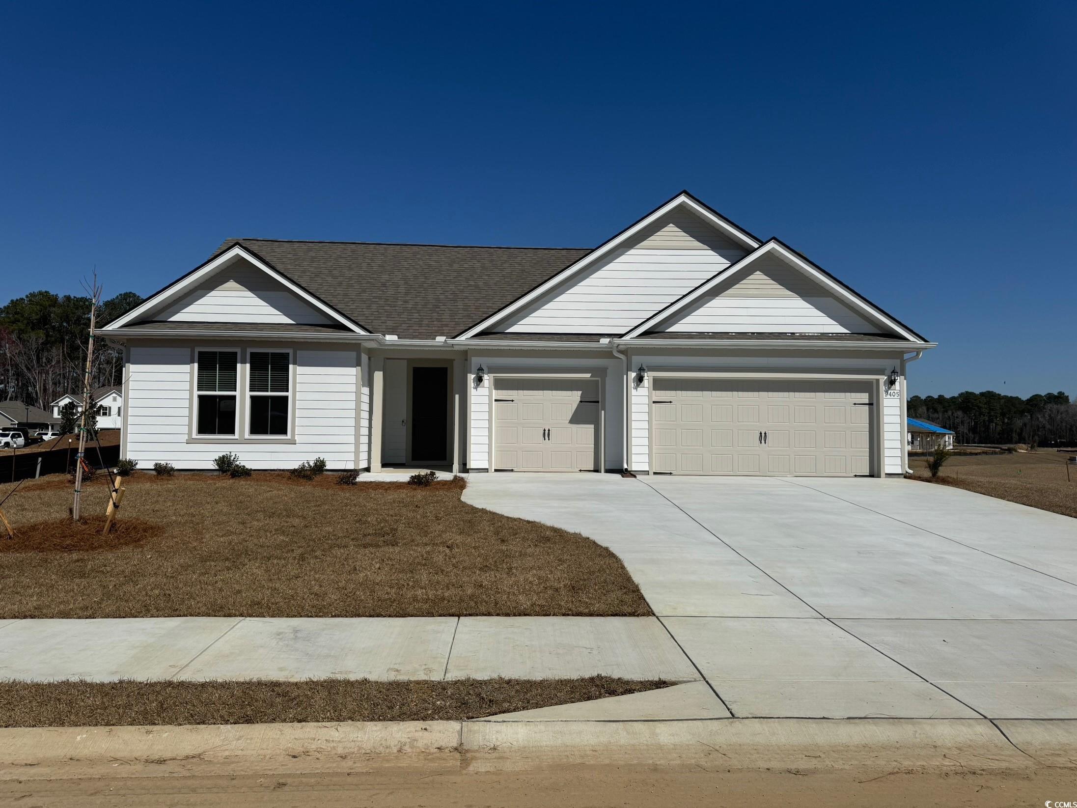 9405 Long Meadow Way Longs, SC 29568 - Photo 1 of 1 Ranch-style house featuring an attached garage, co