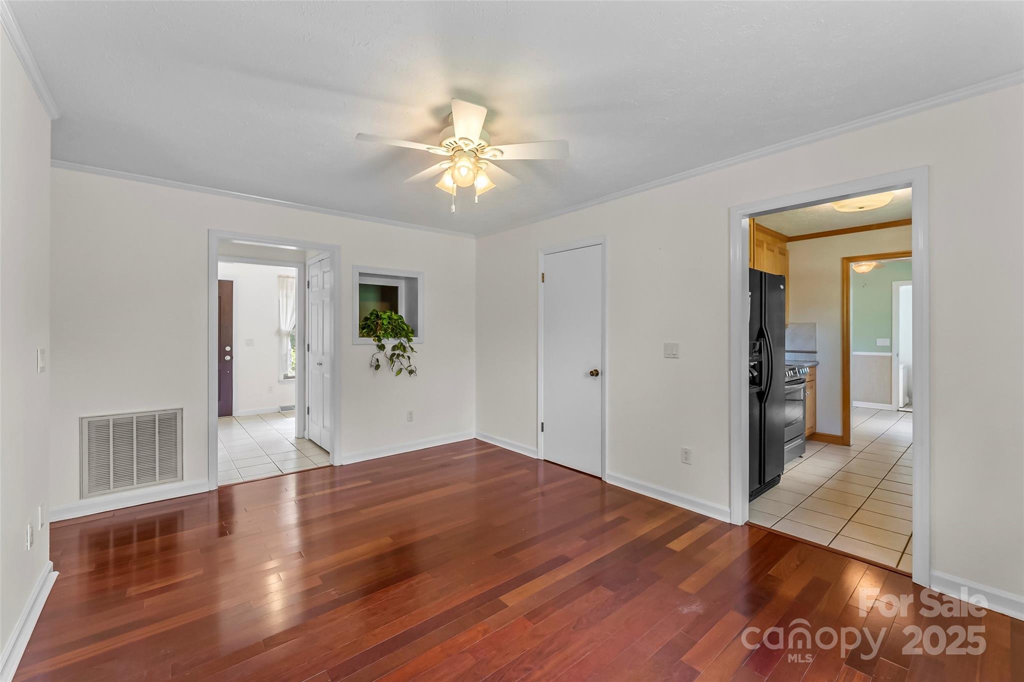 2423 Warrior Fork Trail Morganton, NC 28655 - Photo 15 of 42 a view of an empty room with wooden floor