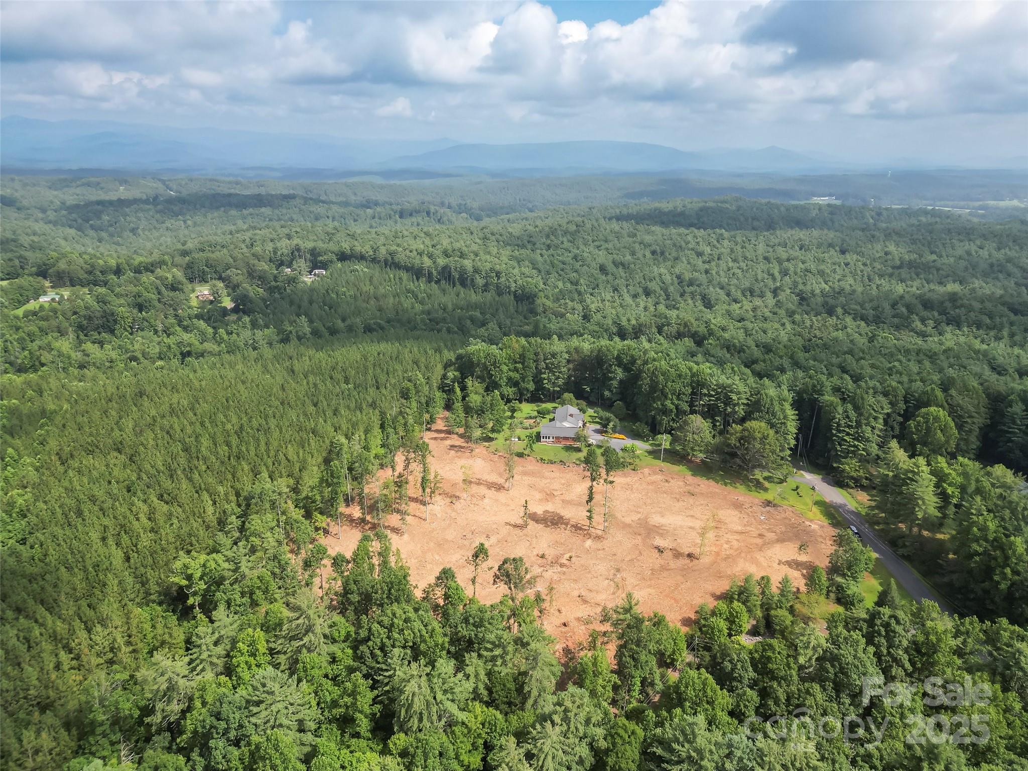 2423 Warrior Fork Trail Morganton, NC 28655 - Photo 39 of 42 a view of a lake with a yard