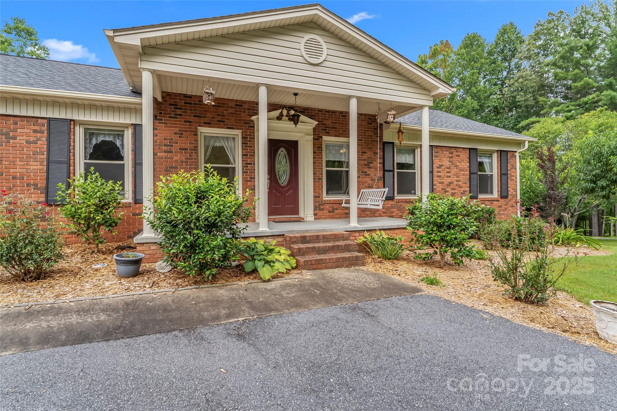 2423 Warrior Fork Trail Morganton, NC 28655 - Photo 42 of 42 front view of a house with a yard