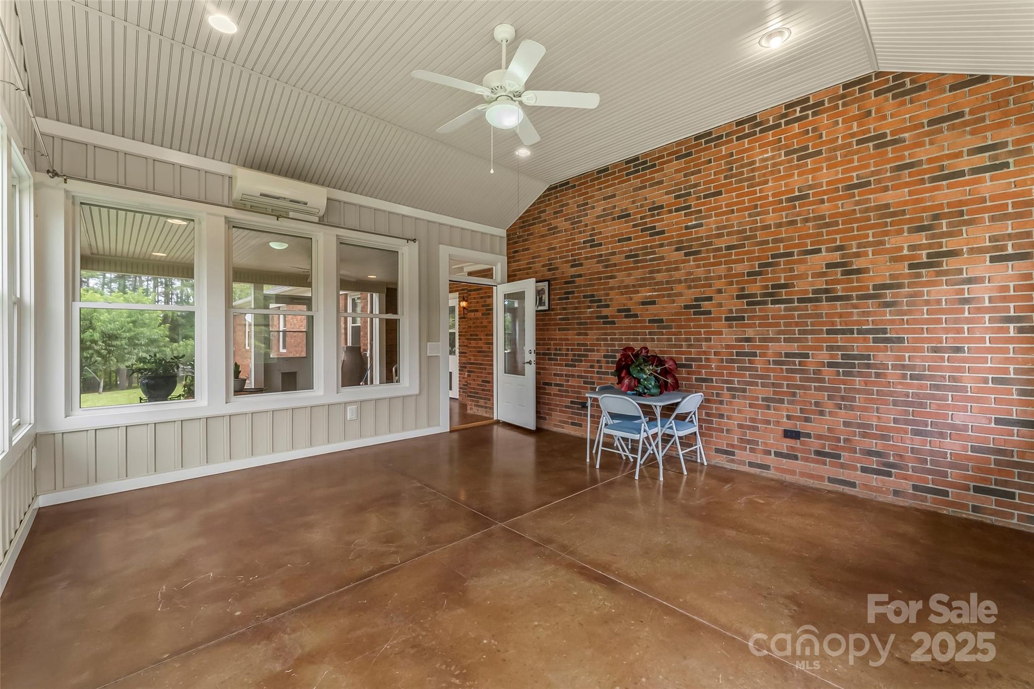 2423 Warrior Fork Trail Morganton, NC 28655 - Photo 5 of 42 a view of a livingroom with furniture and a window
