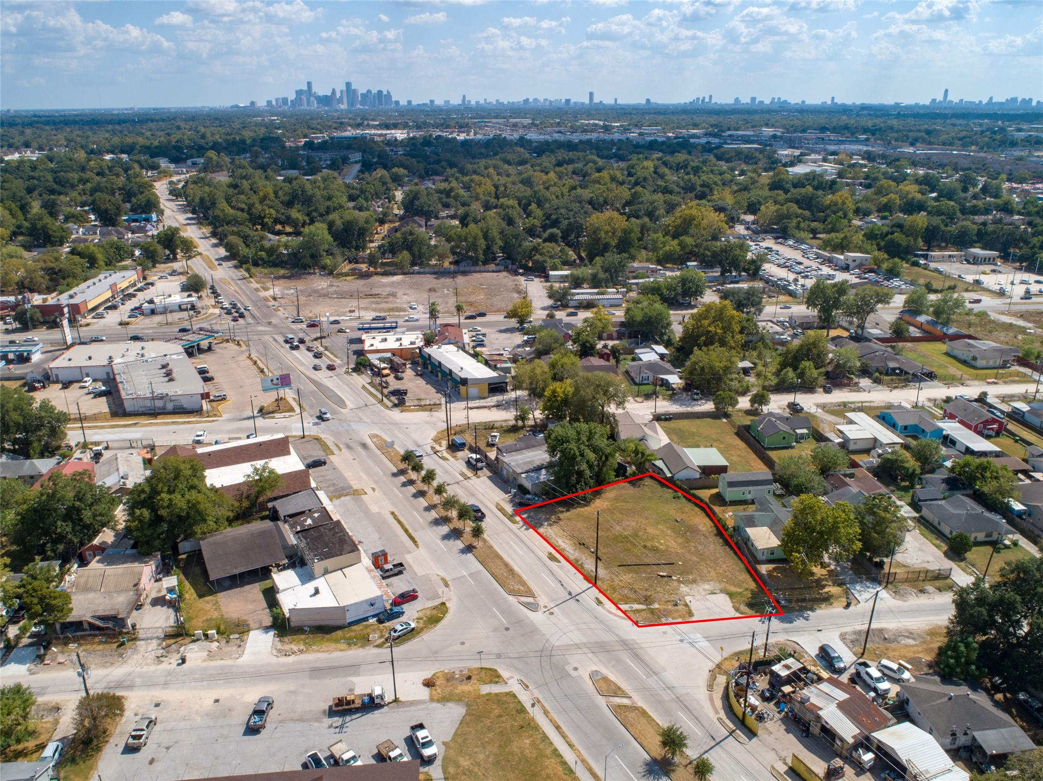 9625 Fulton Street Houston, TX 77076 - Photo 2 of 14 an aerial view of residential houses with outdoor space