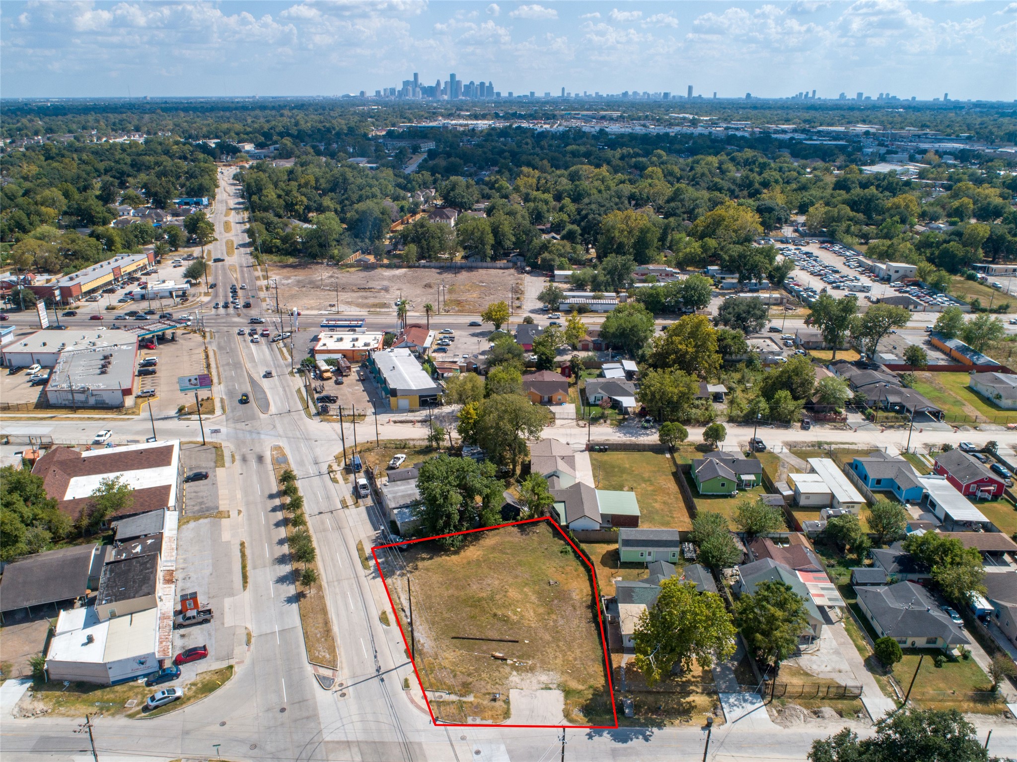9625 Fulton Street Houston, TX 77076 - Photo 4 of 14 an aerial view of residential houses with outdoor space