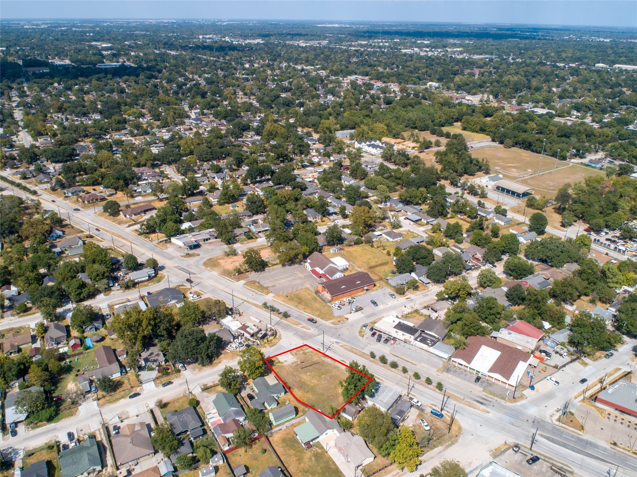 9625 Fulton Street Houston, TX 77076 - Photo 7 of 14 an aerial view of residential houses with outdoor space