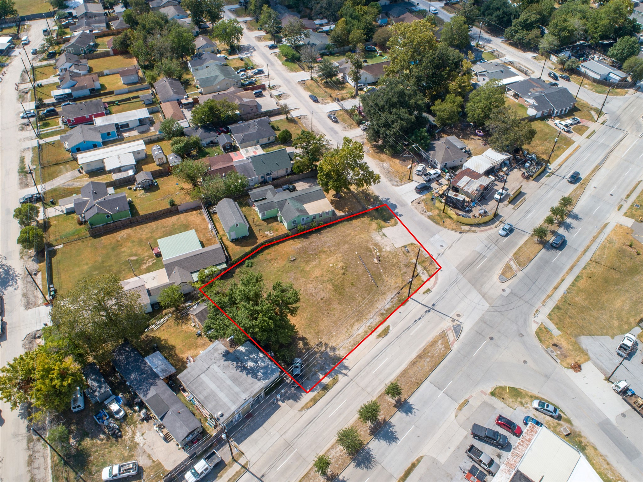 9625 Fulton Street Houston, TX 77076 - Photo 8 of 14 an aerial view of residential houses with outdoor space