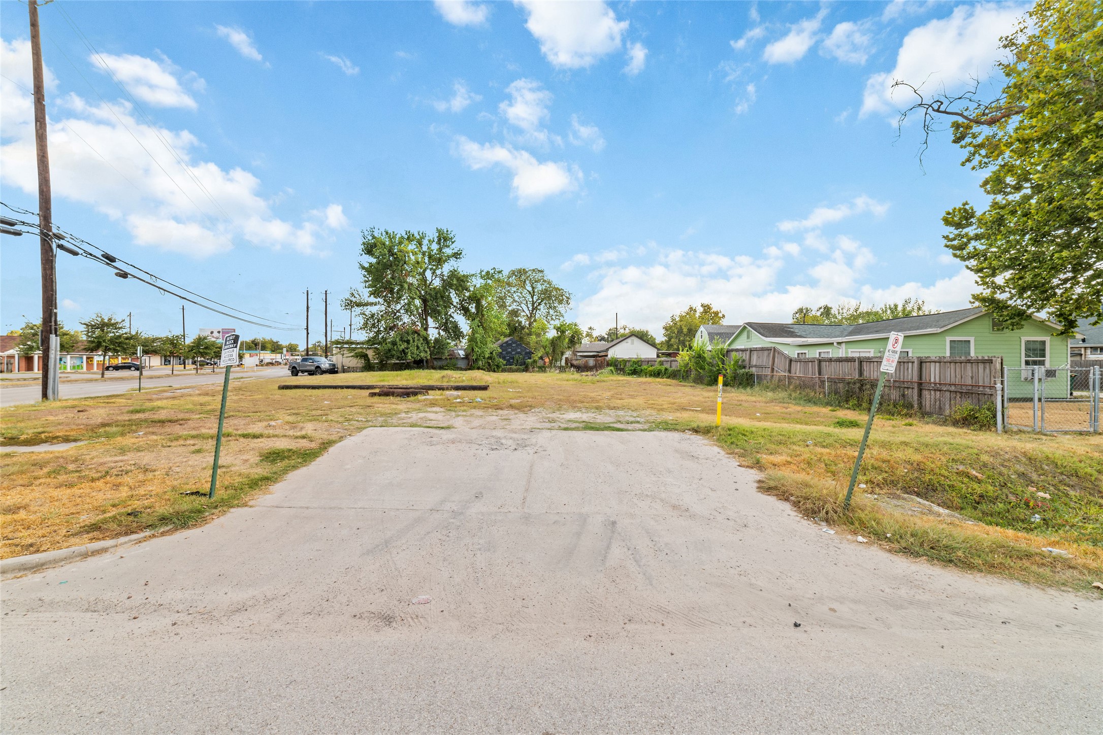 9625 Fulton Street Houston, TX 77076 - Photo 10 of 14 a view of a swimming pool with a yard