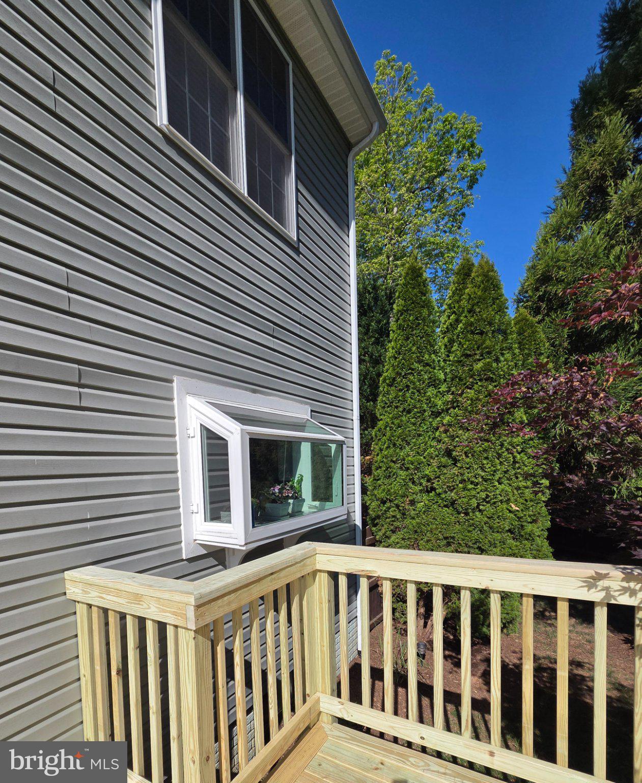 35175 Pheasant Ridge Road Locust Grove, VA 22508 - Photo 55 of 80 Charming deck with lush greenery view.