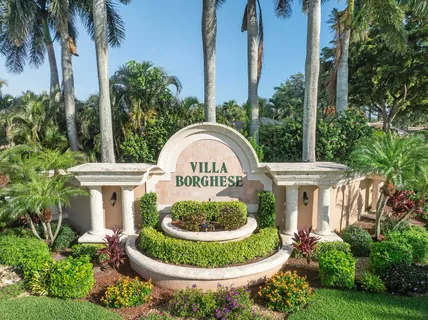 a view of a house with a backyard and a garden