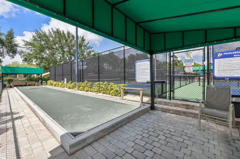 a view of a backyard with a patio