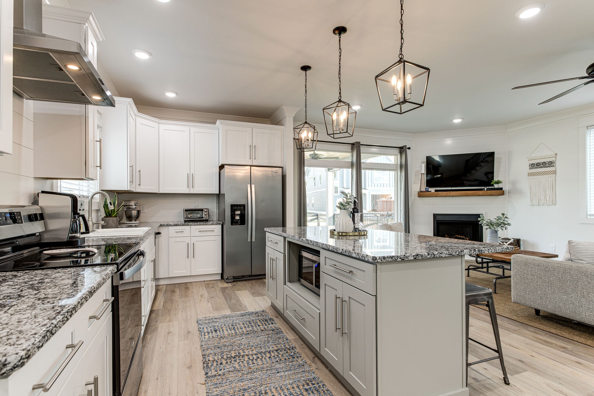 111 Barefoot Way Winchester, TN 37398 - Photo 11 of 33 a kitchen with a sink stainless steel appliances and chandelier