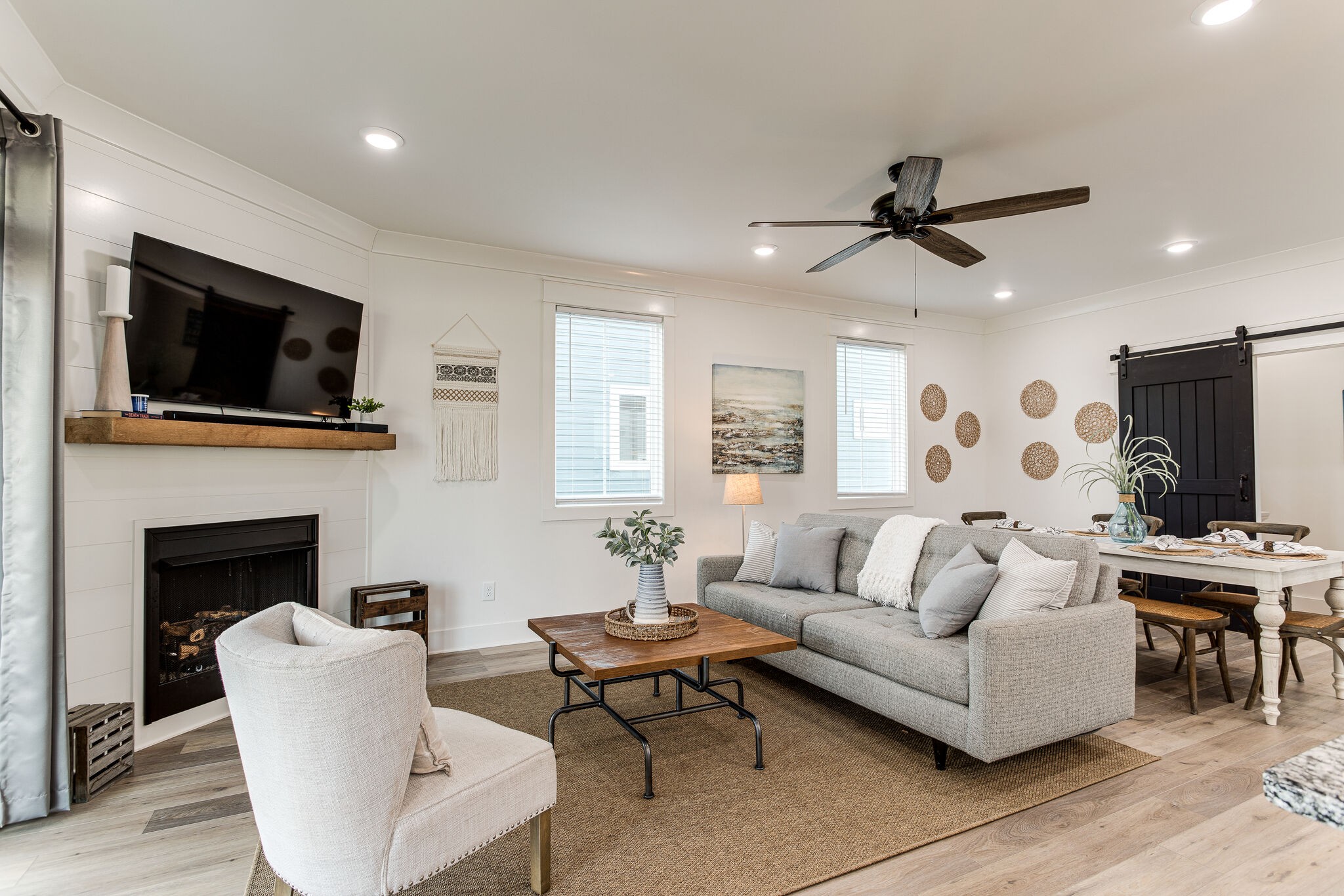 111 Barefoot Way Winchester, TN 37398 - Photo 12 of 33 a living room with furniture a fireplace and a flat screen tv