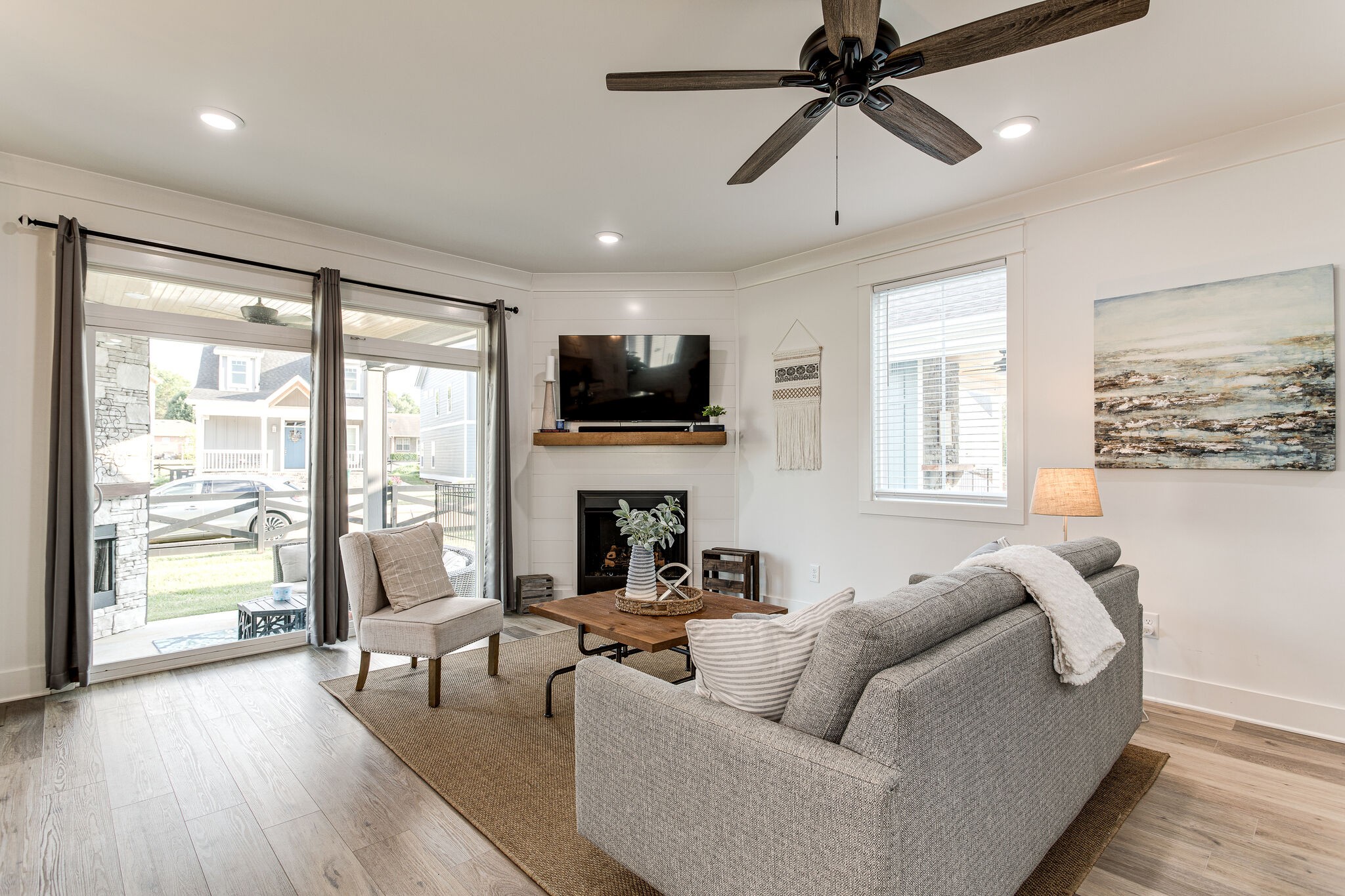111 Barefoot Way Winchester, TN 37398 - Photo 13 of 33 a living room with furniture a fireplace and a flat screen tv