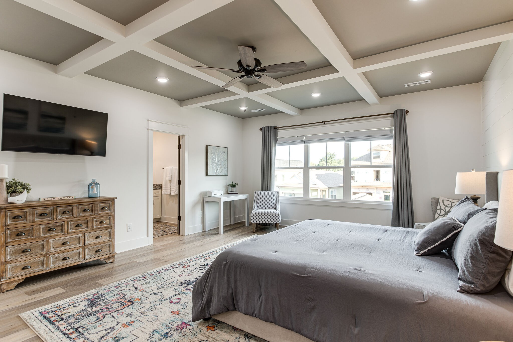 111 Barefoot Way Winchester, TN 37398 - Photo 23 of 33 a spacious bedroom with a bed and a flat screen television