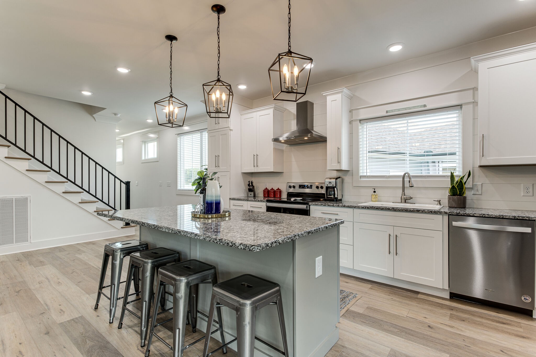 111 Barefoot Way Winchester, TN 37398 - Photo 9 of 33 a kitchen with stainless steel appliances granite countertop wooden floor sink stove and refrigerator