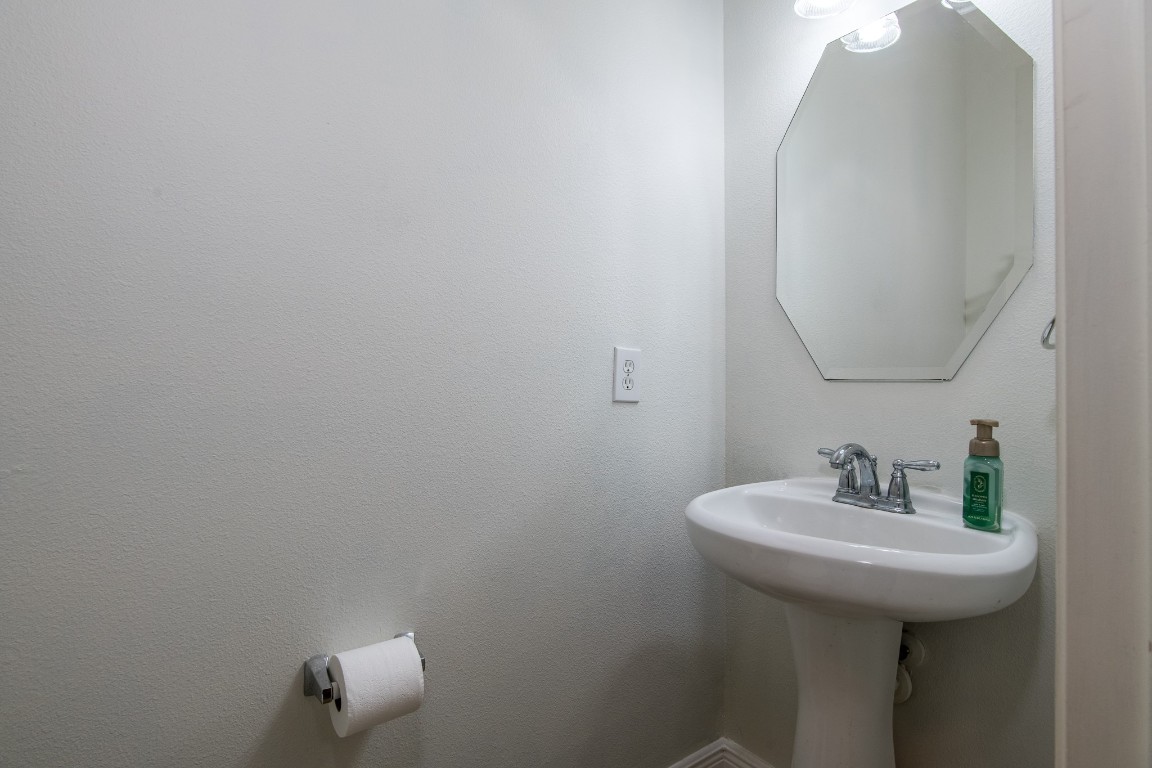 20011 Castlegreen Drive Spring, TX 77388 - Photo 16 of 32 Convenient powder bath for guests.