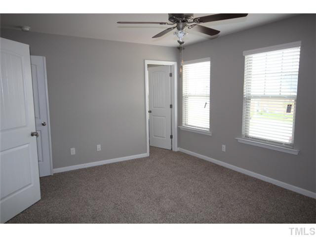2728 Shepherd Valley Street Raleigh, NC 27610 - Photo 11 of 15 a view of an empty room with a window