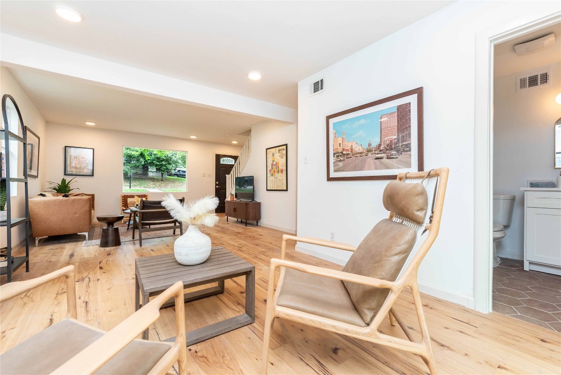 3801 Wilson Street Austin, TX 78704 - Photo 20 of 36 a view of a dining room with furniture a rug and wooden floor