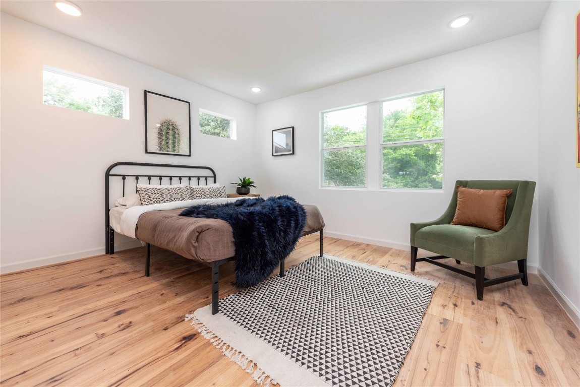3801 Wilson Street Austin, TX 78704 - Photo 29 of 36 a bedroom with a bed a couch and a window