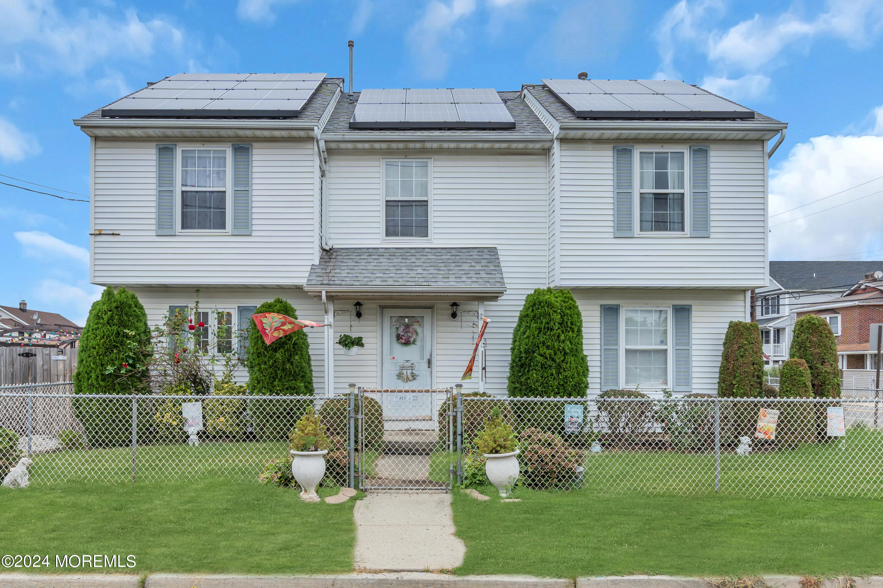 415 Union Avenue Union Beach, NJ 07735 - Photo 1 of 17 a front view of a house with a yard
