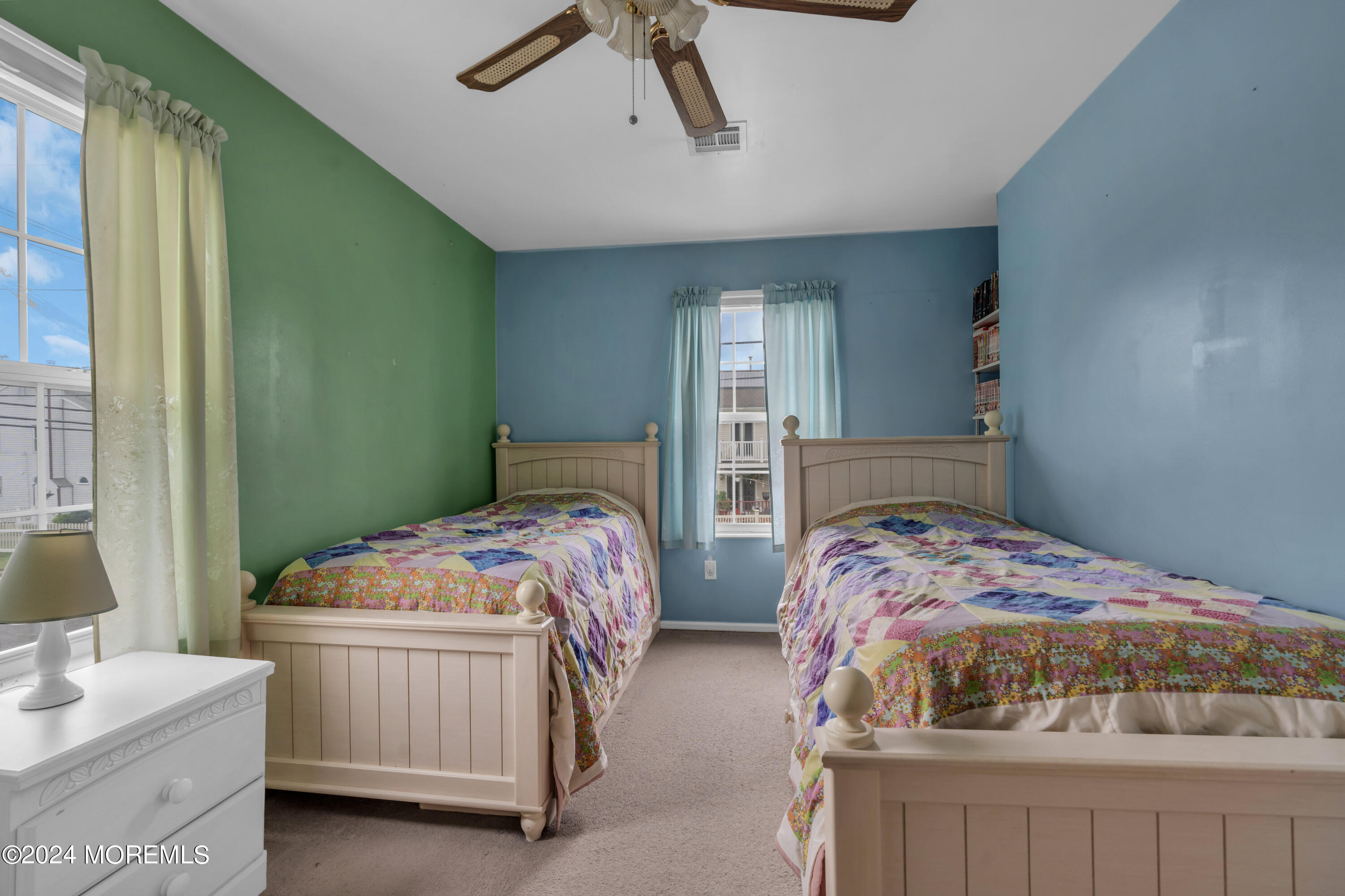 415 Union Avenue Union Beach, NJ 07735 - Photo 14 of 17 a bedroom with a bed and a window