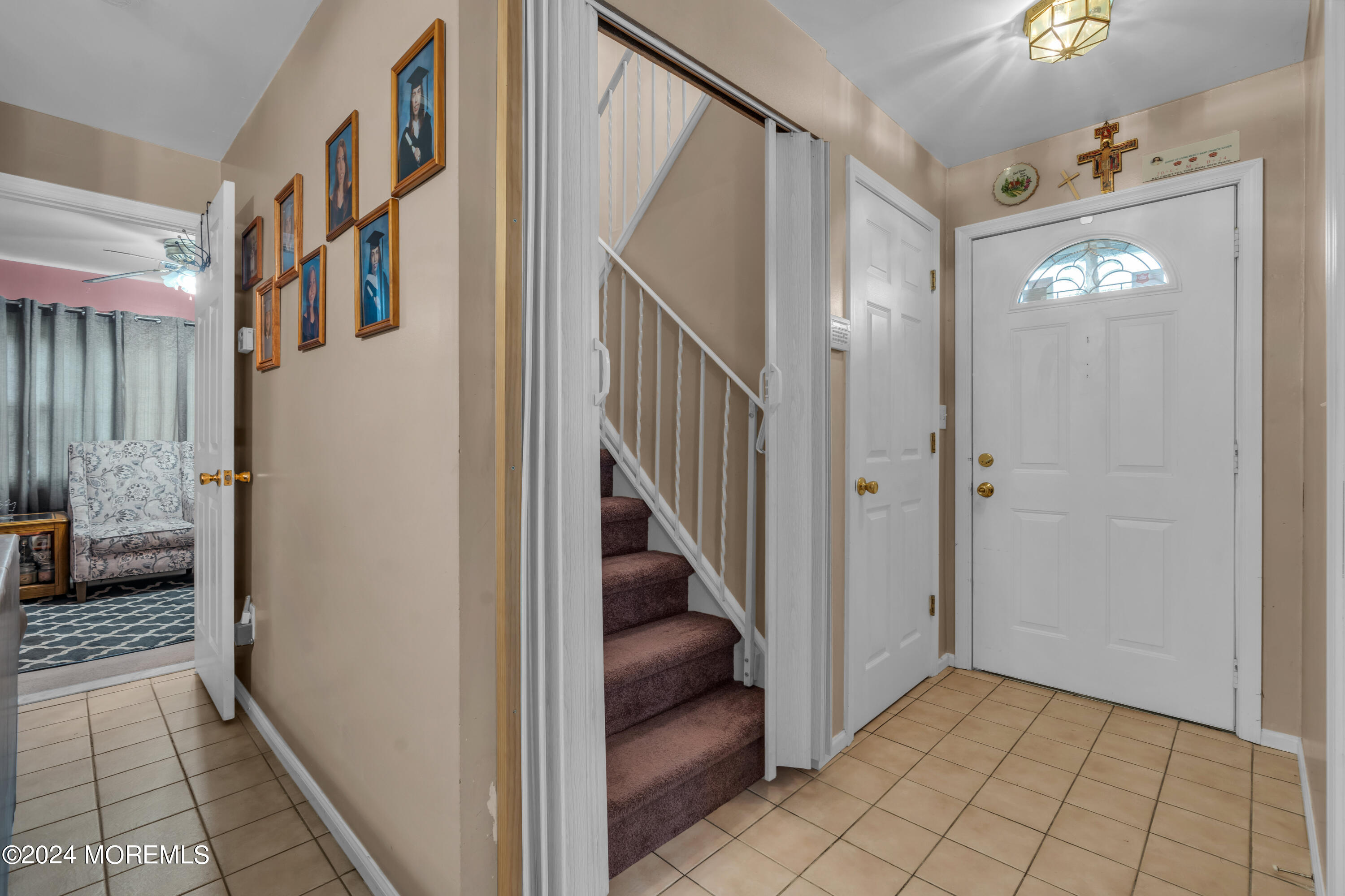 415 Union Avenue Union Beach, NJ 07735 - Photo 2 of 17 a view of a hallway with entryway and stairs