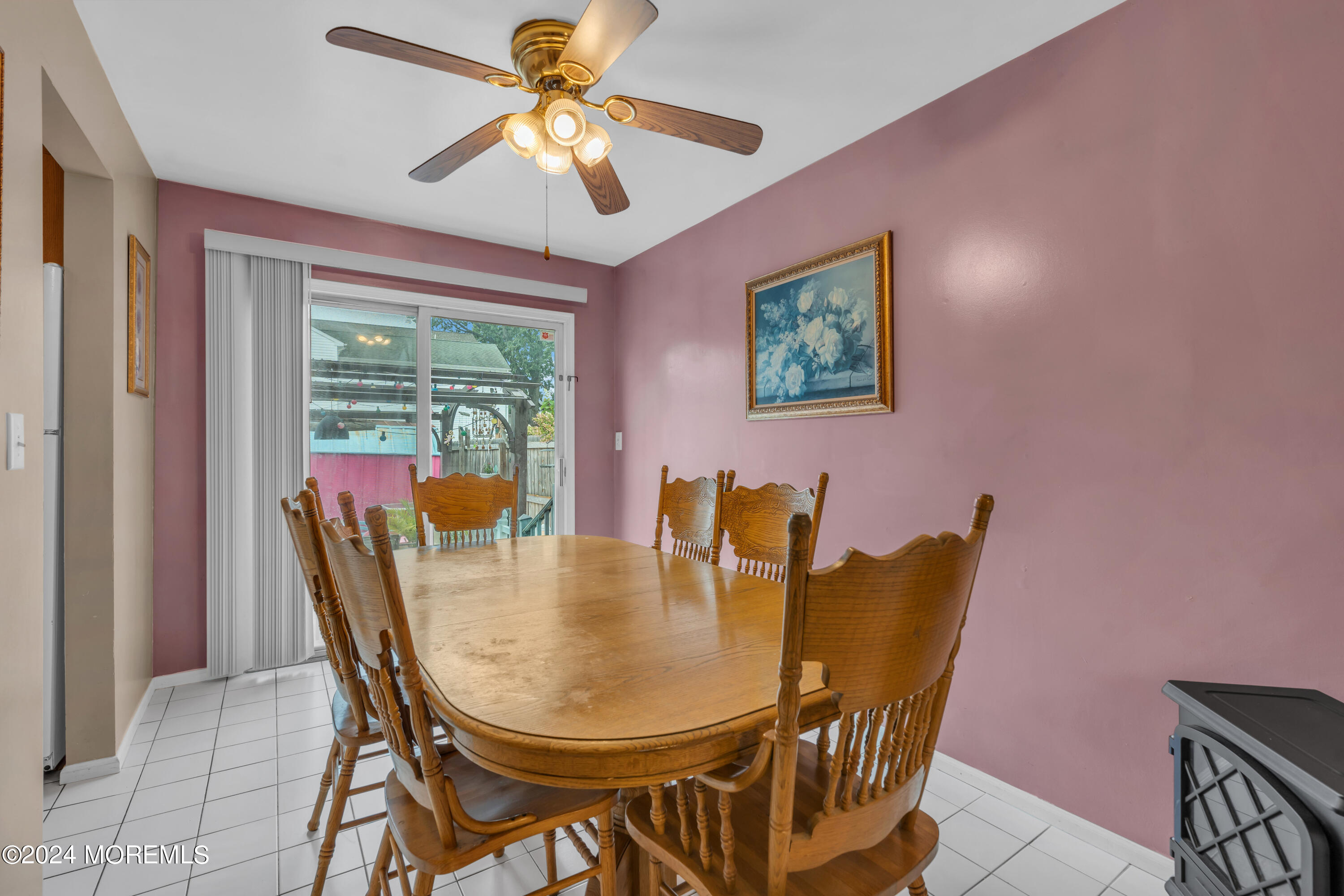 415 Union Avenue Union Beach, NJ 07735 - Photo 4 of 17 a view of a dining room with furniture window and outside view