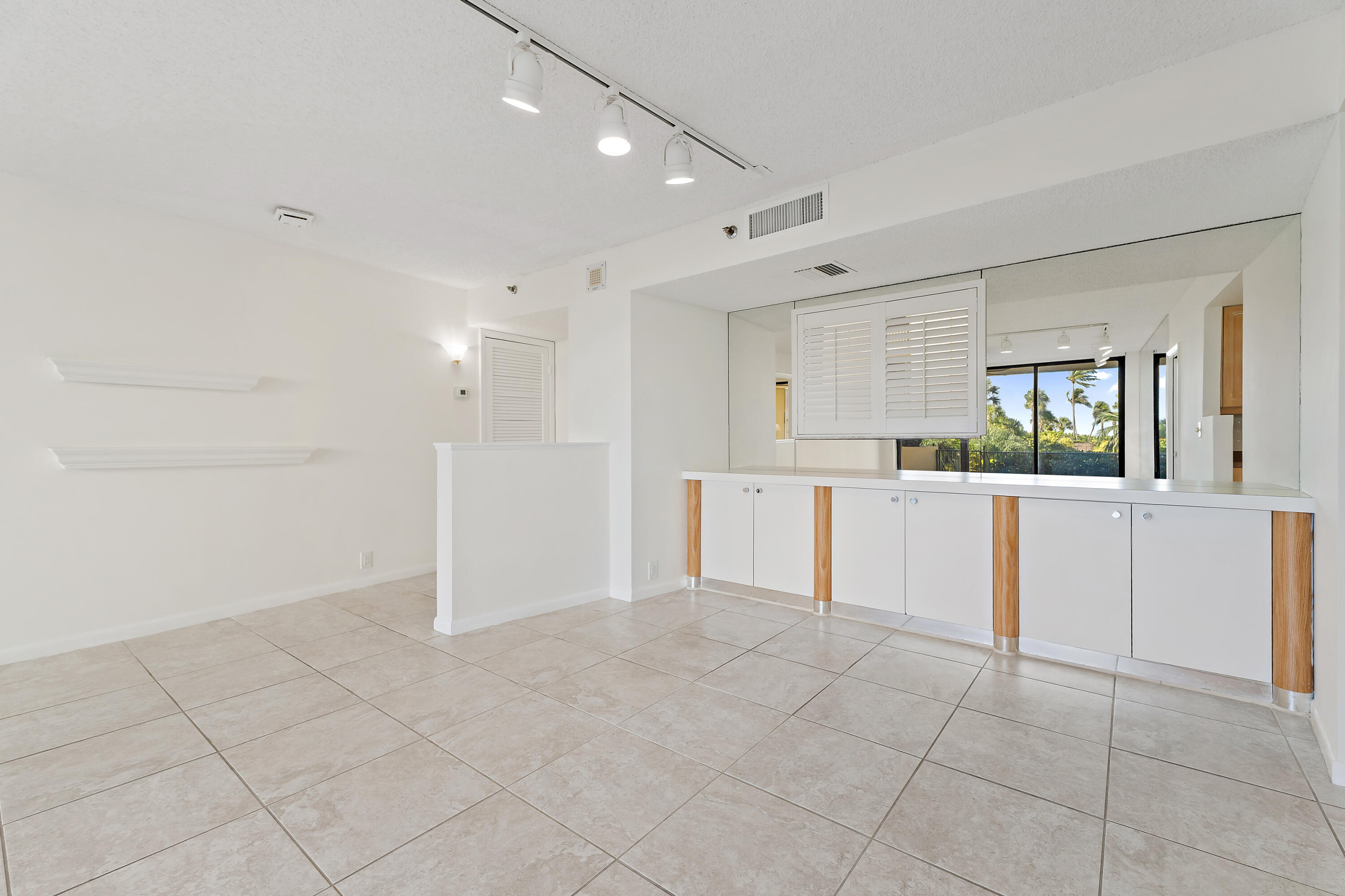300 Ocean Trail Way, Unit 102 Jupiter, FL 33477 - Photo 11 of 30 a view of a kitchen with a sink