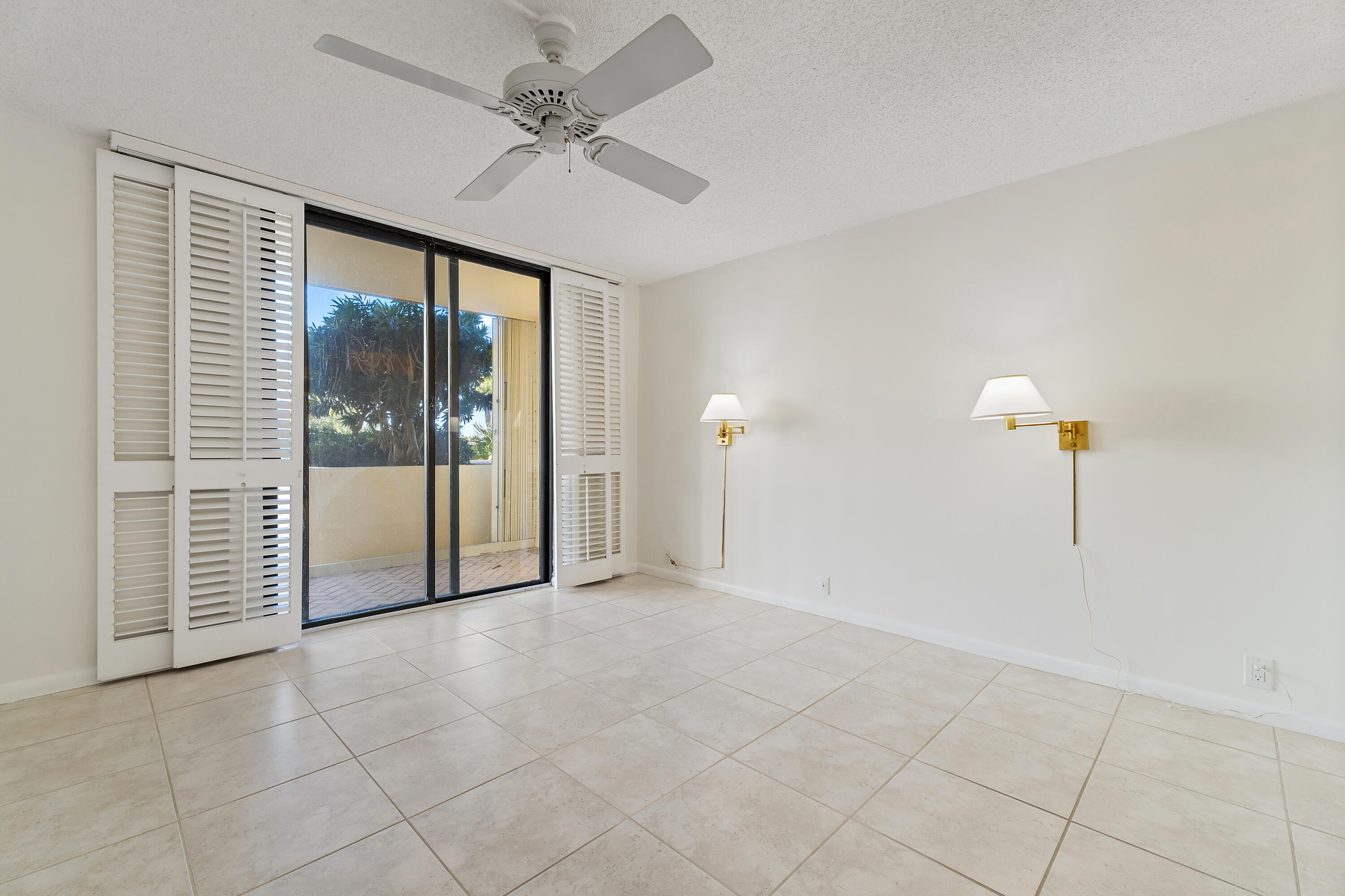 300 Ocean Trail Way, Unit 102 Jupiter, FL 33477 - Photo 14 of 30 a view of an empty room with a window