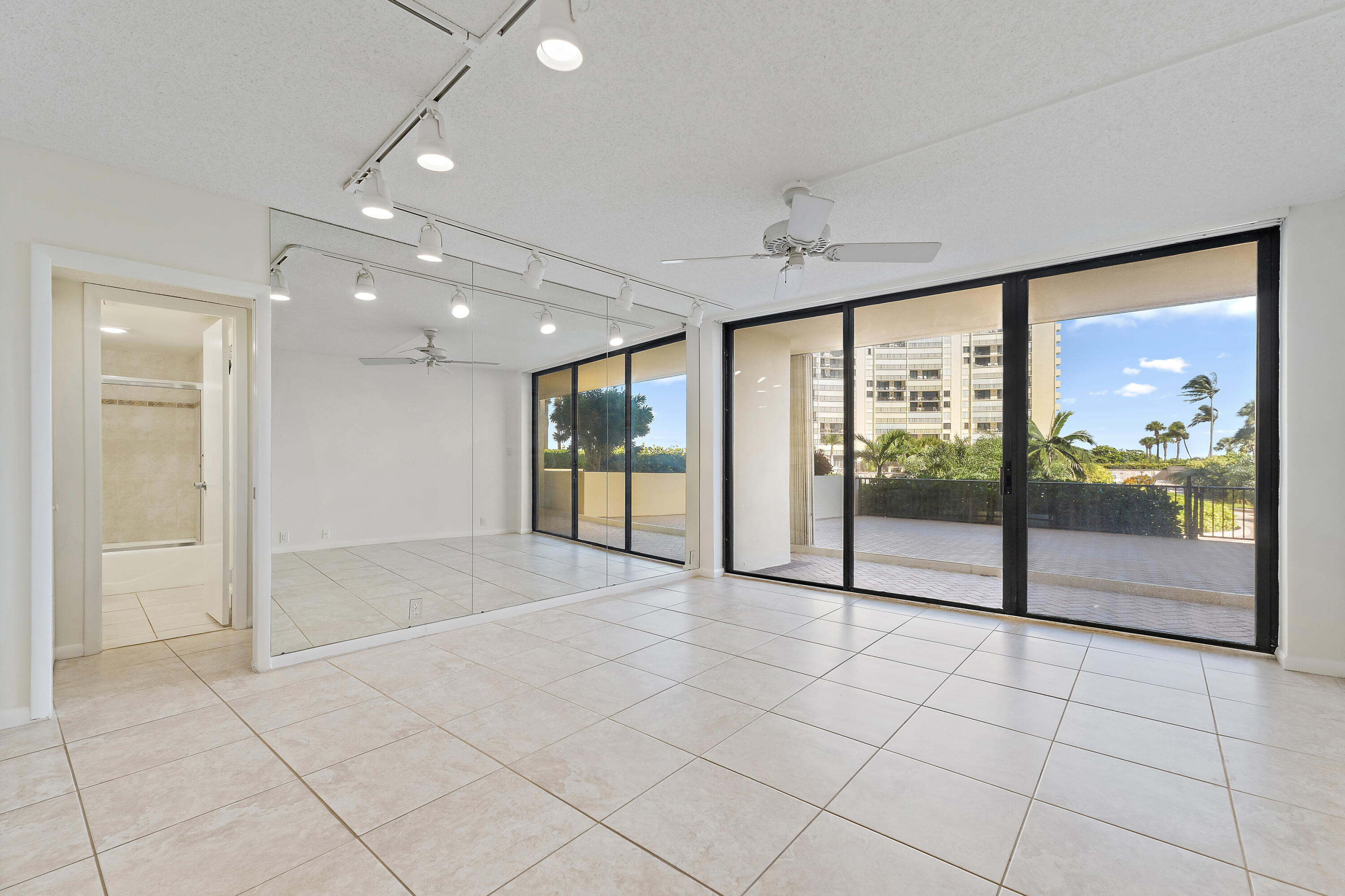 300 Ocean Trail Way, Unit 102 Jupiter, FL 33477 - Photo 10 of 30 a view of an entryway with wooden floor