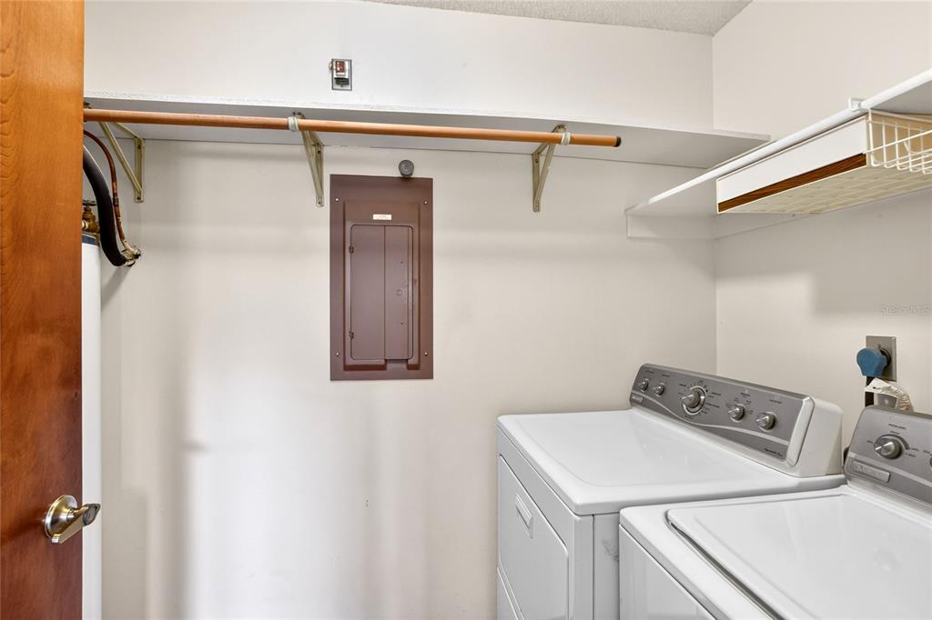 2025 Sylvester Road, Unit E1 Lakeland, FL 33803 - Photo 32 of 37 a utility room with dryer and washer