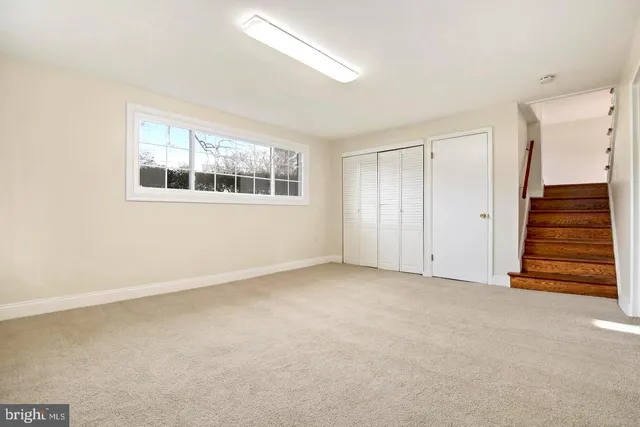 a bathroom with a toilet and shower