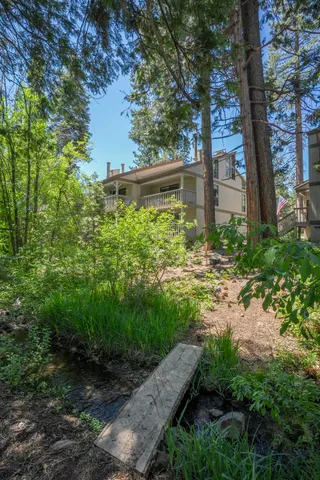 a backyard of a house with lots of green space