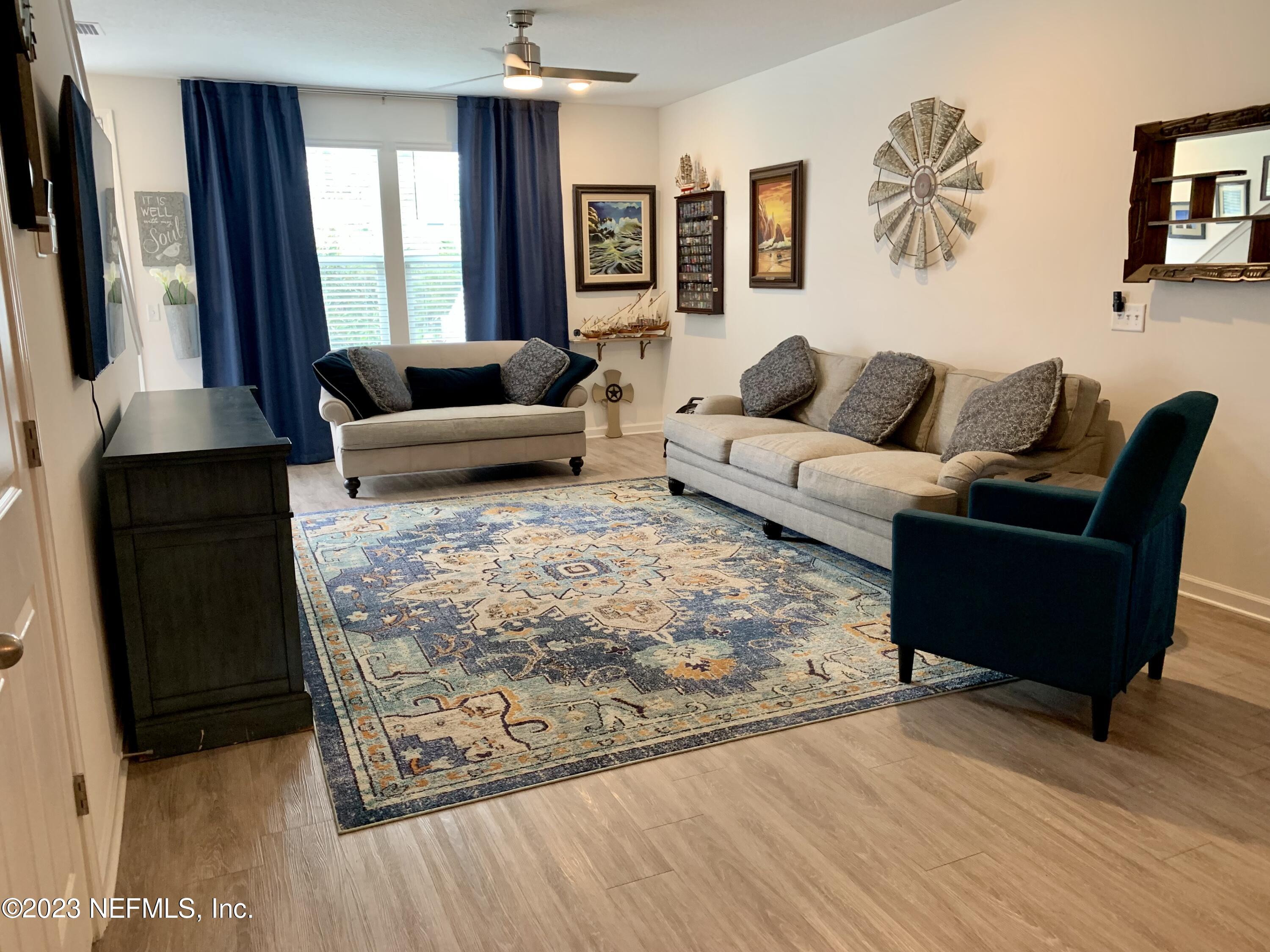 25 Ridge Lake Road St. Augustine, FL 32086 - Photo 1 of 27 a living room with furniture and a window