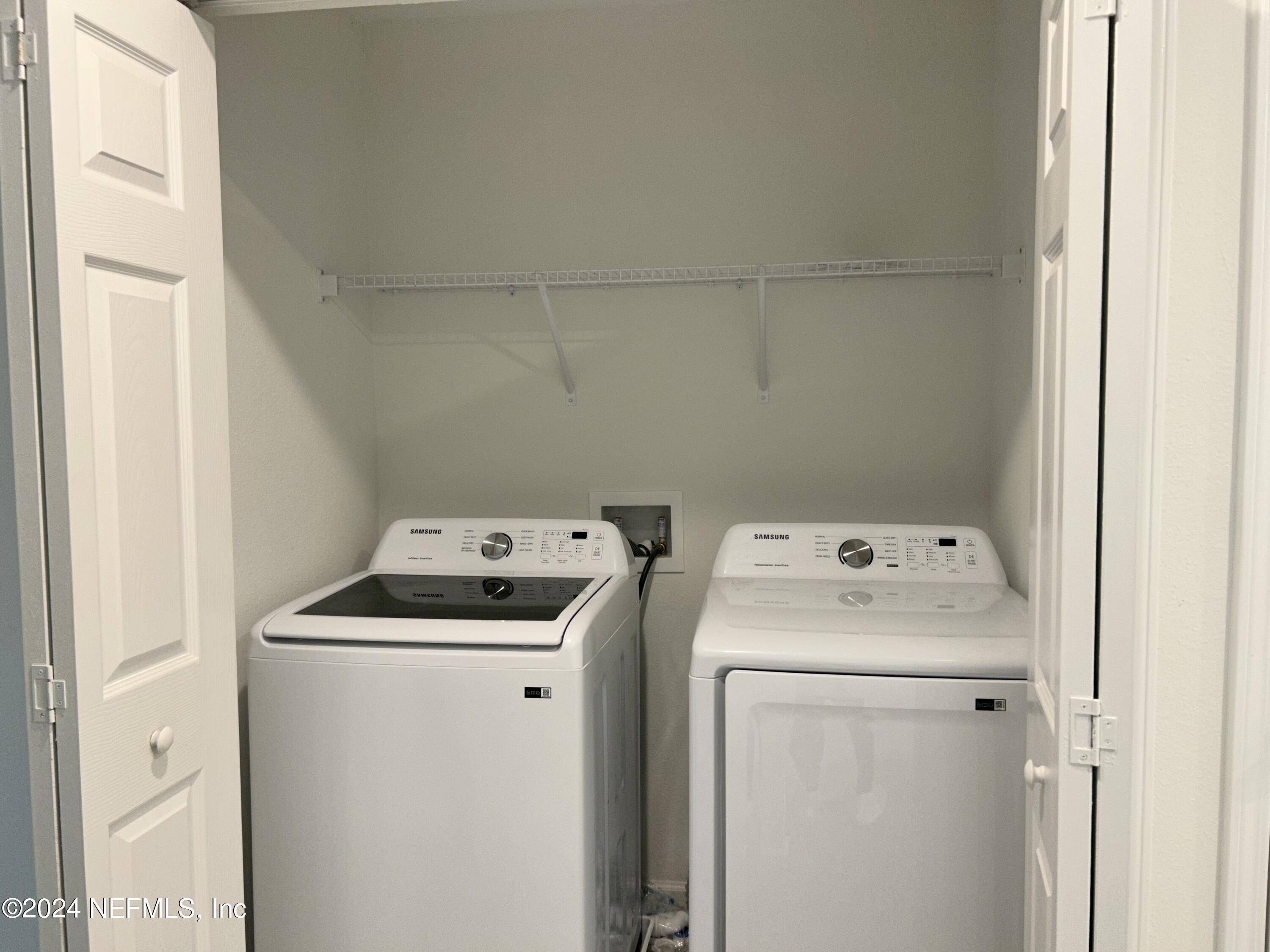 25 Ridge Lake Road St. Augustine, FL 32086 - Photo 12 of 27 a utility room with dryer and washer