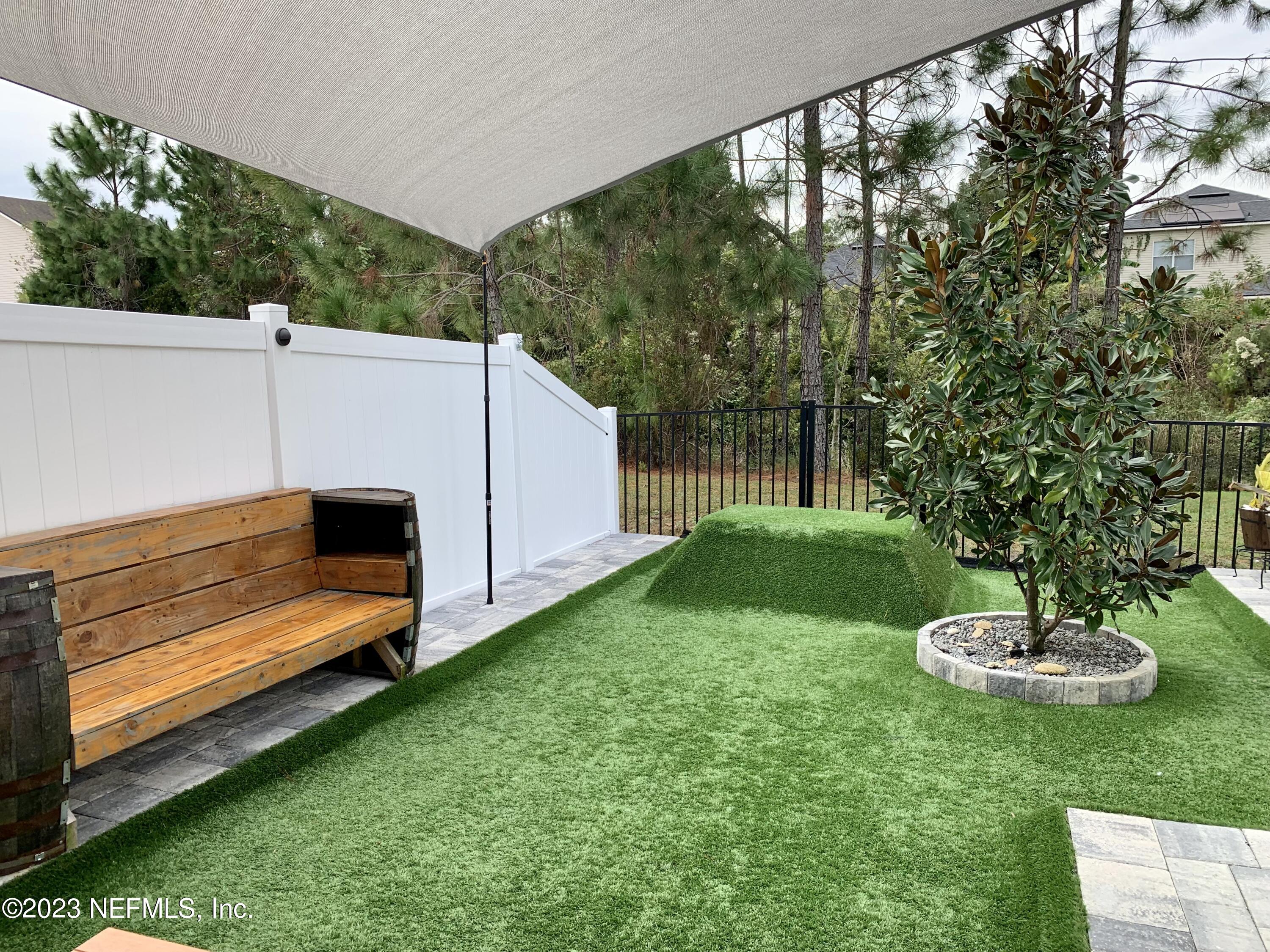 25 Ridge Lake Road St. Augustine, FL 32086 - Photo 14 of 27 a view of a backyard with a sitting area