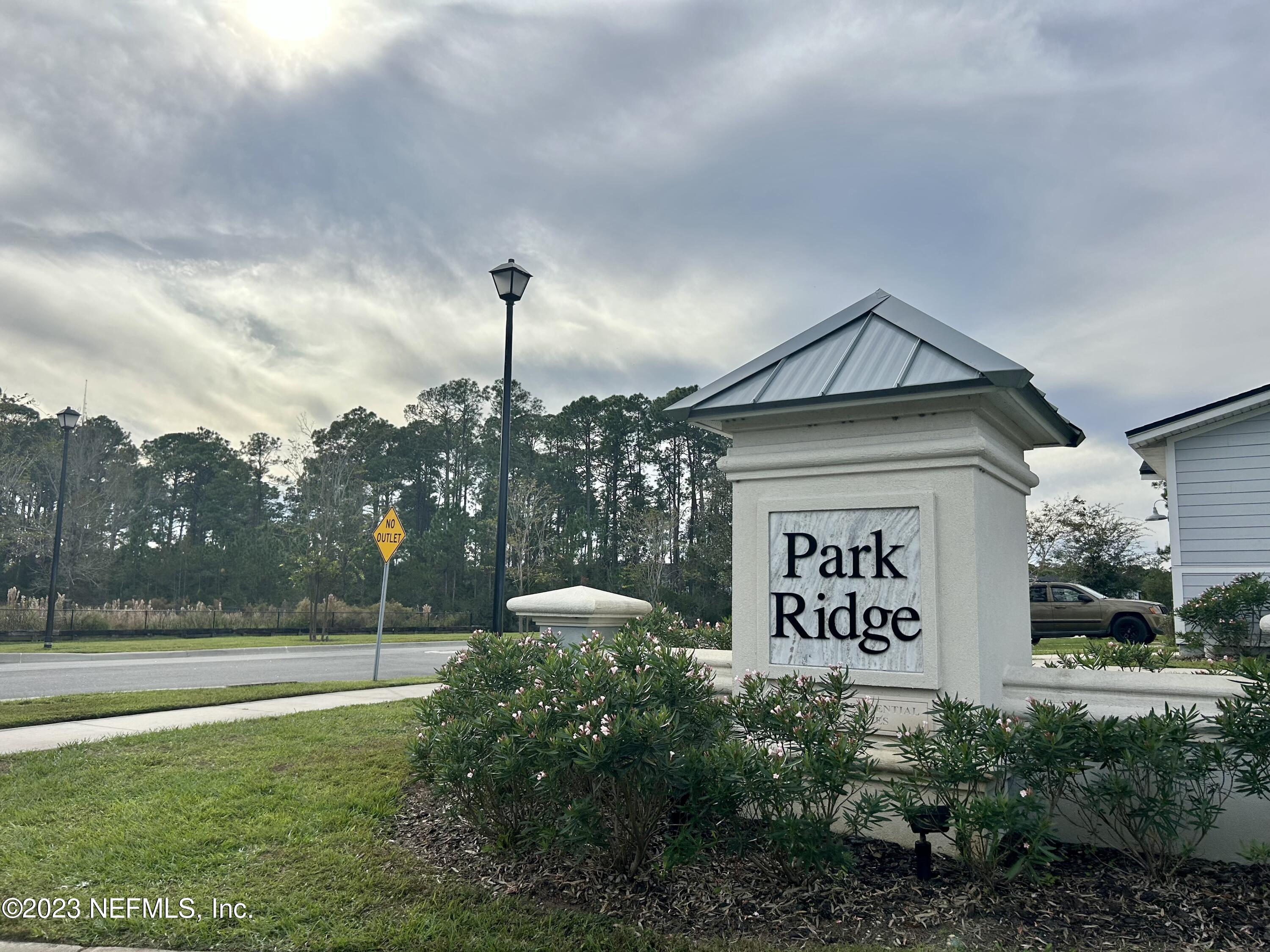 25 Ridge Lake Road St. Augustine, FL 32086 - Photo 25 of 27 a sign board with a house and garden