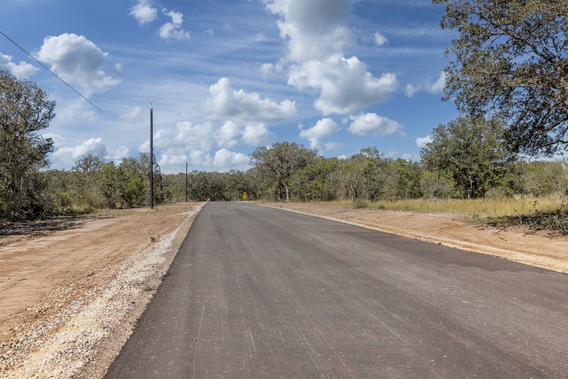 56 Post Oak Road Gonzales, TX 78629 - Photo 2 of 3 a view of a road with a yard