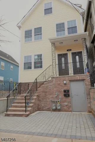 a view of a building with a bench