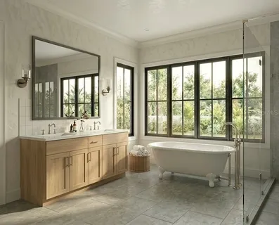 a bathroom with a double vanity sink large mirror and a bathtub