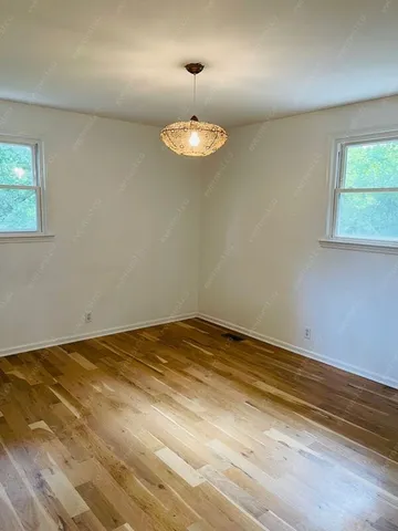 a view of a room with a window