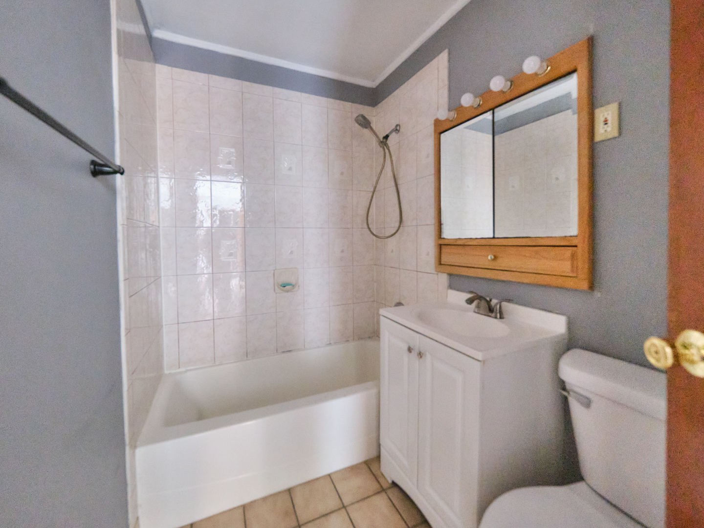 109 George Road Wheeling, IL 60090 - Photo 8 of 12 a bathroom with a sink toilet and shower
