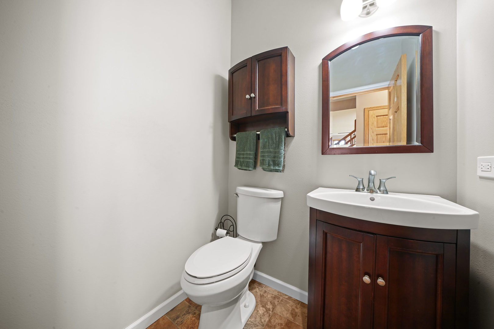 10808 Michigan Drive Spring Grove, IL 60081 - Photo 14 of 26 a bathroom with a toilet a sink and mirror