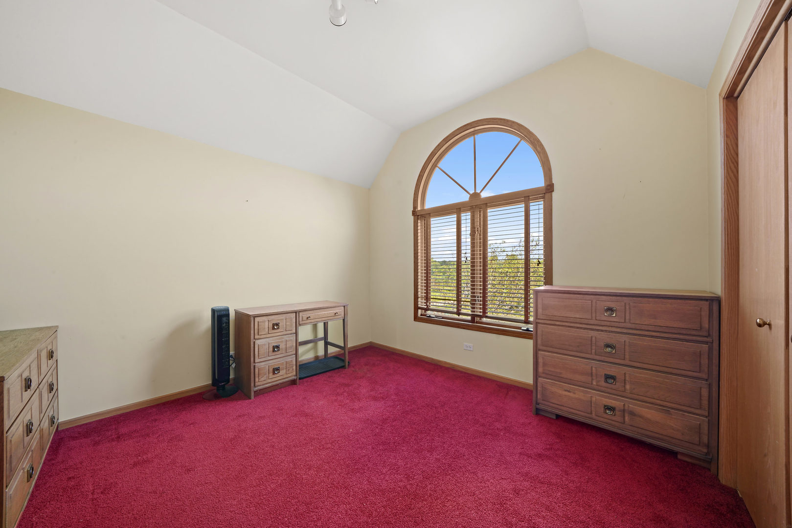 10808 Michigan Drive Spring Grove, IL 60081 - Photo 19 of 26 a living room with furniture and a window