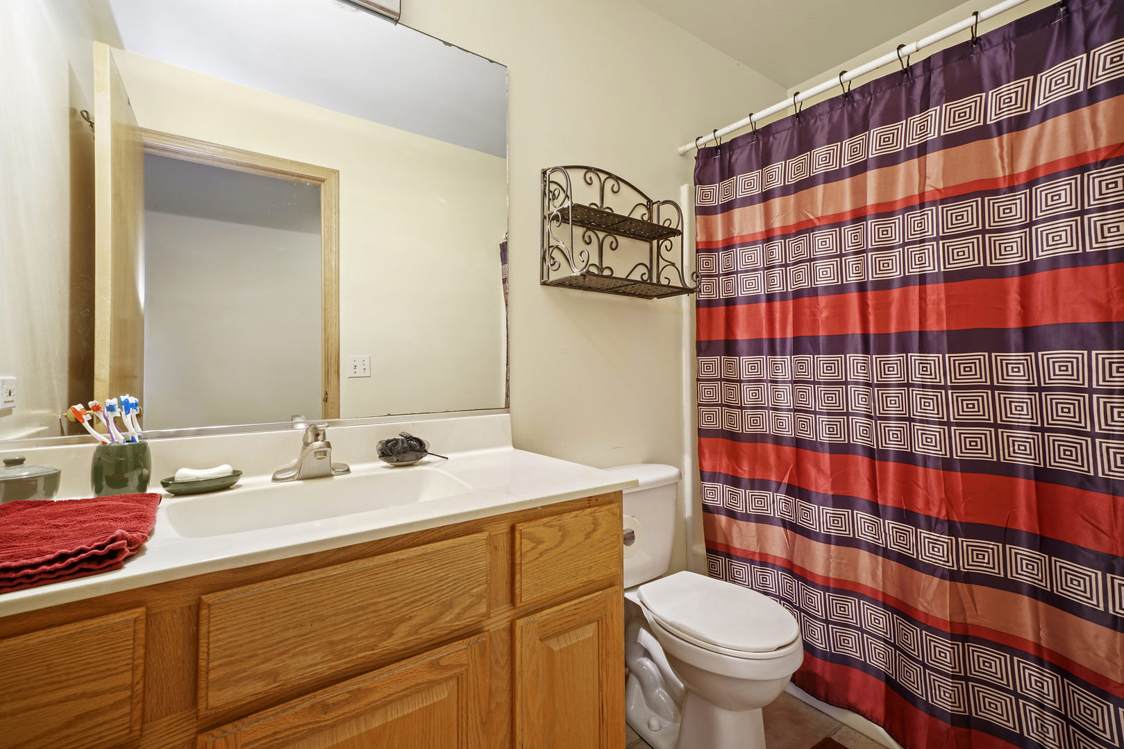 10808 Michigan Drive Spring Grove, IL 60081 - Photo 20 of 26 a bathroom with a sink toilet and shower