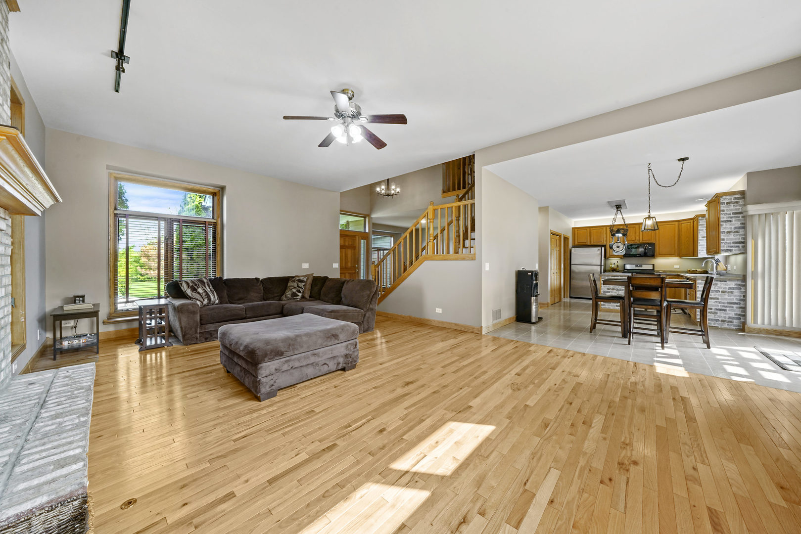 10808 Michigan Drive Spring Grove, IL 60081 - Photo 10 of 26 a living room with furniture and wooden floor